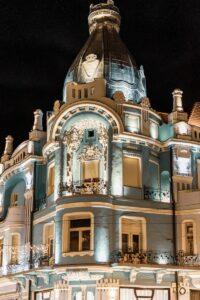 a large building with a clock on the top of it