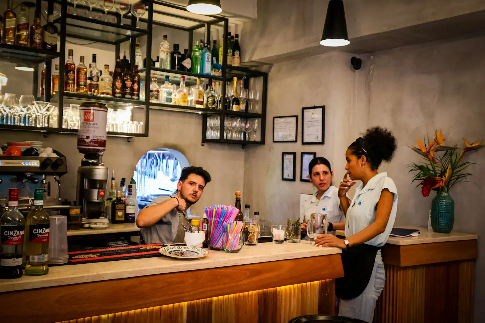 Photo by Meg von Haartman People are at the bar inside of a restaurant.