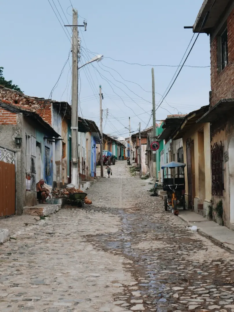 a cobblestone street in a small village