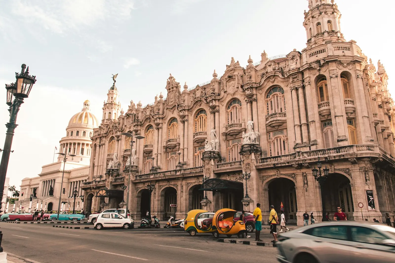 Photo by Manuel González Asturias, SJ El capitolio building with classic cars on street.